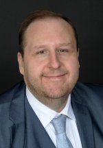 Chris Hatton, journalist and Legra Academy Trust member, in a professional portrait photo